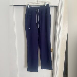 Navy blue high-waisted Kade Cargo Figs scrub pants